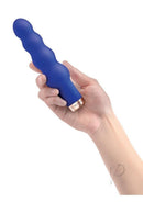 Bodywand My First Ripple Vibe Silicone Vibrator Blue held in hand, showcasing its ridged, tapered design.