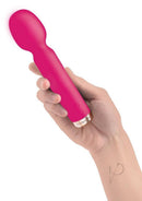 Bodywand My First Mini Wand Vibe Silicone Vibrator Rose held in a hand, showcasing its sleek pink design.