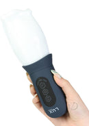 LUX Active First Class Rotating Masturbator Cup Navy/White held in hand showcasing its design and controls.