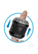 Nasstoys Dynamo Dual End Vibrating Masturbator Cup Black in use with textured tunnel and strong vibrations.