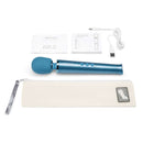 Le Wand Petite Rechargeable Massager Blue with user guide, USB charging cable, and storage pouch.