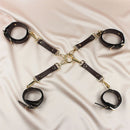 Edonista Venice 14 Piece Bondage Set featuring adjustable leather restraints on a silk backdrop.