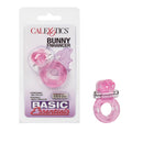 Basic Essentials Bunny Enhancer Vibrating Cock Ring Pink packaging with bunny stimulator and stretchy ring.