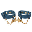 Ride 'em Premium Denim Collection Ankle Cuffs in stylish denim with gold chain detailing and adjustable fit.