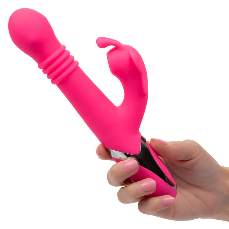 Enchanted Kissing Butterfly Vibrator Pink held in hand, showcasing its luxurious design and dual stimulation features.