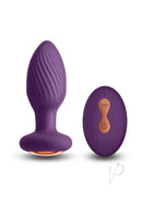 Inya Alpine Silicone Anal Plug with Remote Control Purple alongside its remote for enhanced anal play.