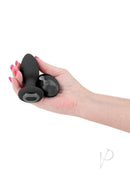 Renegade Alpine Silicone Anal Plug with Remote Control held in hand, showcasing design and remote feature.