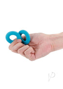 Renegade Erectus Silicone Cock Ring Teal held in hand showing vibrant color and ergonomic design.