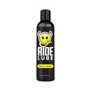 Ride Booty Buzz Stimulating Silicone Anal Lube 8.5 Oz bottle featuring a vibrant design for backdoor play.