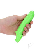 Ouch Smooth Stretchy Penis Sleeve Glow in the Dark Green held in hand showcasing its vibrant color.