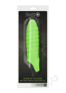 Ouch Swirl Thick Penis Sleeve Glow in the Dark Green in packaging, showcasing its vibrant fluorescent design.
