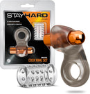 Stay Hard Clitoral Stimulating Cock Ring Set with Spiked Sleeve packaging and products, featuring a vibrating cock ring and spiked sleeve.