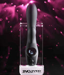 Black Magic Rechargeable Silicone Rabbit Vibrator displayed in an elegant case with vibrant pink background.
