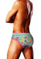 Prowler Swimming Brief Medium Blue worn by a model showcasing a stylish design with colorful patterns on the back.