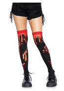 Leg Avenue Splatter Thigh Highs OS Red on a model wearing black shorts and chunky shoes, showcasing the edgy splatter design.