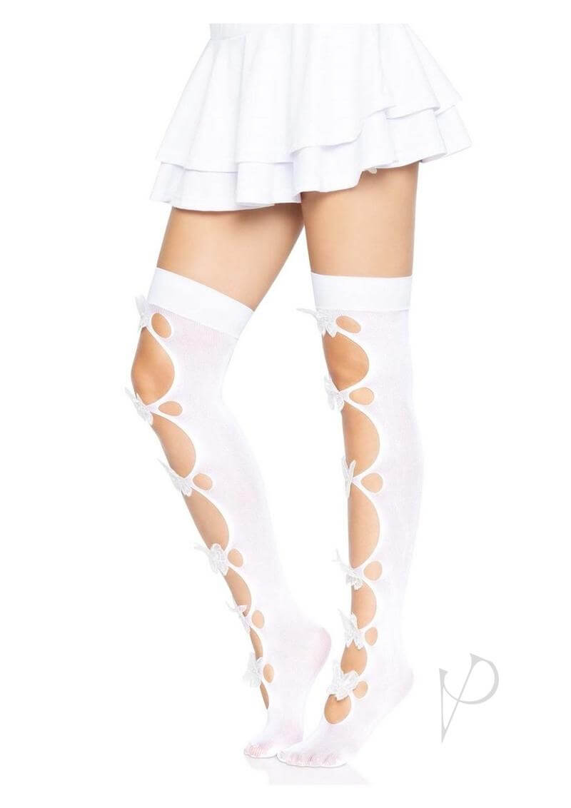 Leg Avenue Opaque Net Cut Out Butterfly Thigh Highs OS White worn with a flirty white skirt, showcasing intricate cut-out design.