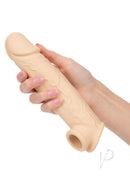 Performance Maxx Life-Like 8 Inch Penis Extension Vanilla held in hand, showcasing its realistic design and texture.