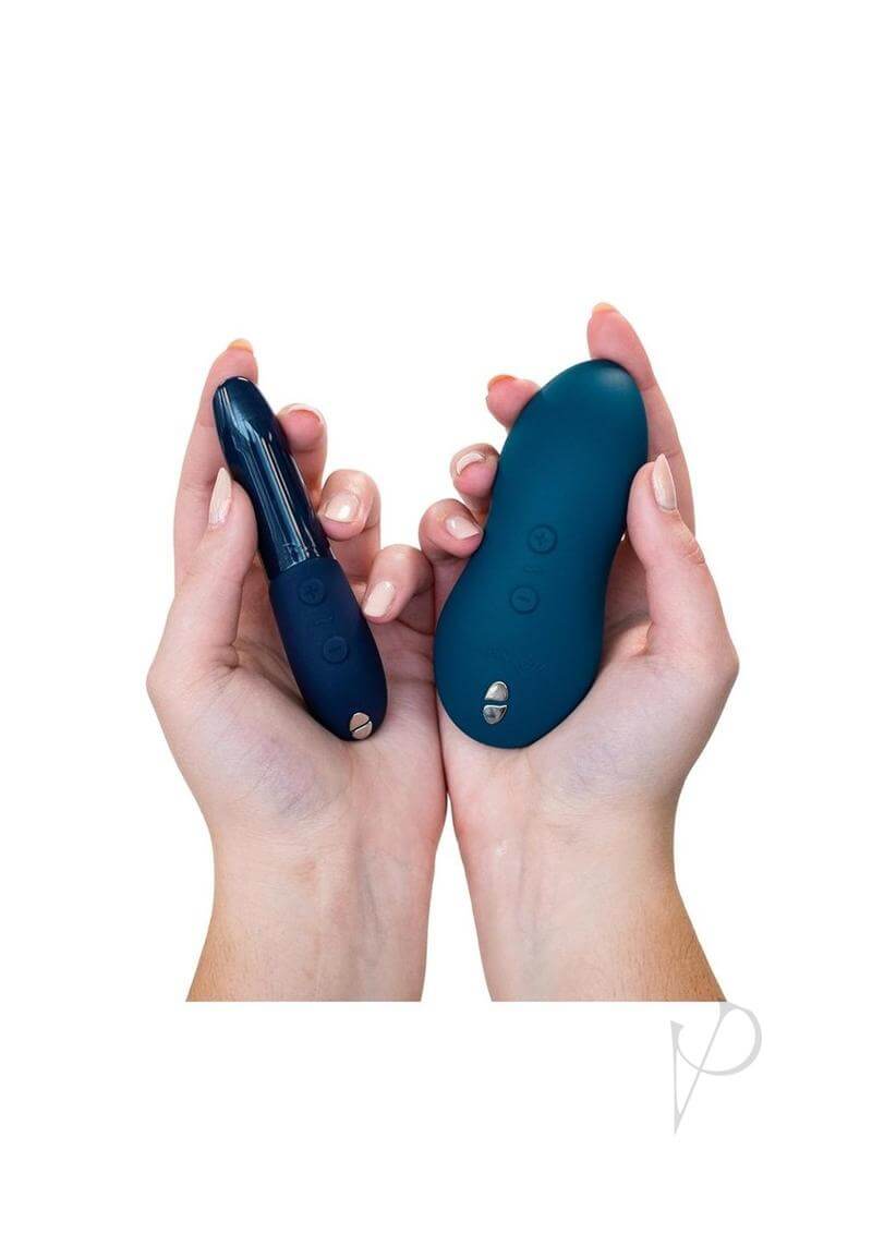 We-Vibe Forever Favorites Set held in hands, featuring Tango X bullet vibrator and Touch X massager in blue and green.