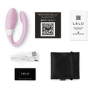 Lelo Mahana Originals Couples Vibrator Soft Pink with accessories including USB cable and warranty card.