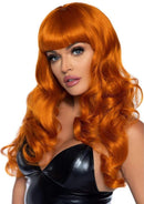 Leg Avenue Misfit 24 Inch Long Wavy Bang Wig Ginger worn by a model with bold ginger waves and bangs.