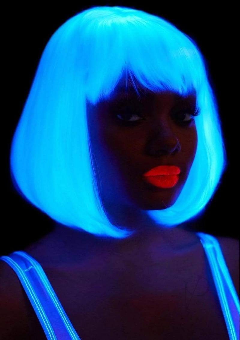 13" Pearl Short Natural Bob Wig glowing under UV light, perfect for Halloween, cosplay, and festivals.