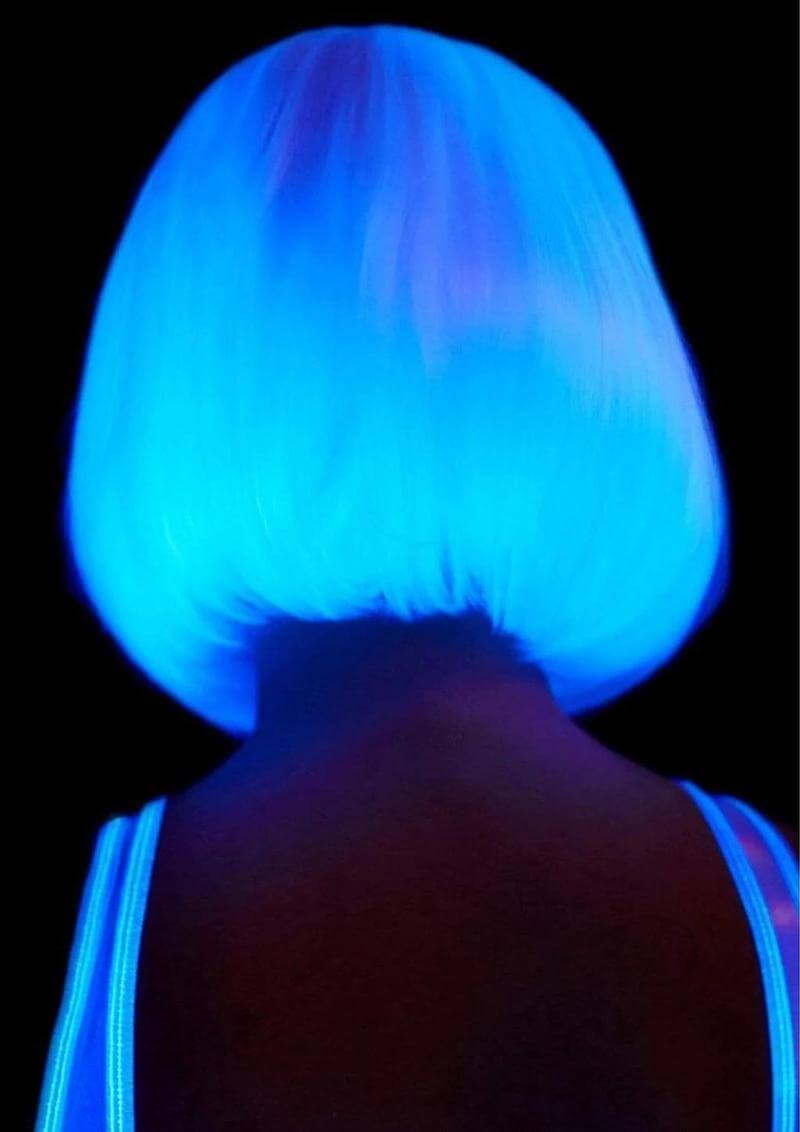 13" Pearl Short Natural Bob Wig glowing under blacklight, Halloween cosplay festival ready