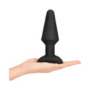 b Vibe Rimming XL Rotating and Vibrating Remote Control Plug Black in a hand for size reference.