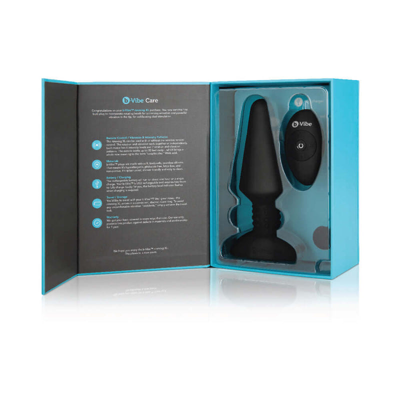 b Vibe Rimming XL Rotating and Vibrating Remote Control Plug Black inside packaging with remote control