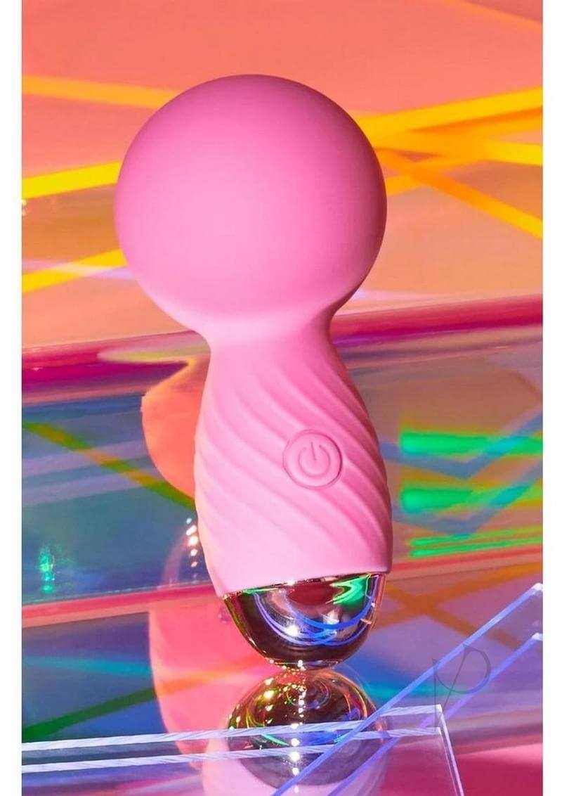 Itsy Bitsy Tiny Wand Massager Pink on a colorful background showcasing its compact design and powerful features.