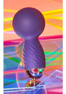 Itsy Bitsy Tiny Wand Massager Midnight Indigo in vibrant colors, showcasing its compact and powerful design.