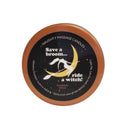 Naughty Notes Candle Ride A Witch pumpkin spice massage candle packaging with playful design.