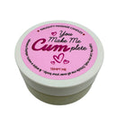 Naughty Notes You Make Me Cum-plete Massage Candle 1.7 Oz in a pink container with playful text and hearts.