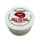 Kama Sutra Naughty Notes Throb Massage Candle 1.7 Oz with playful message on the lid.