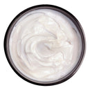 Earthly Body Hemp Seed Sunsational Skin Butter 8oz creamy moisturizer in a black jar, perfect for dry skin.