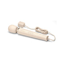 Le Wand Plug-In Vibrating Massager Cream with a sleek design and power cord for continuous performance.