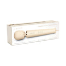 Le Wand Plug-In Vibrating Massager Cream in sleek packaging showcasing powerful design and features.