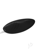 WhipSmart Magic Carpet Ride Silicone Vibrating Pad Black on a clean surface, showcasing its sleek design and textured bumps.