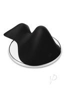WhipSmart Bump and Grind Silicone Vibrating Pad Black on a reflective surface for non-penetrative pleasure.