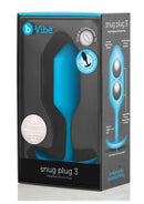 B-Vibe Snug Plug 3 Silicone Weighted Anal Plug Teal packaging showcasing its features and design.