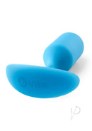 B-Vibe Snug Plug 3 Silicone Weighted Anal Plug Teal in vibrant teal color, showcasing its sleek design.