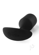 B-Vibe Snug Plug 4 Silicone Weighted Anal Plug Black on a white background, showcasing its sleek design and soft material.
