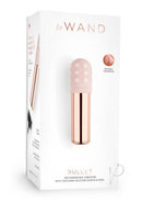 Le Wand Bullet Vibrator with Textured Sleeve Rose Gold in stylish packaging, showcasing its innovative design and features.