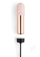 Le Wand Bullet Vibrator with Textured Sleeve Rose Gold in a rose gold and pink design with a charging base.