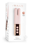 Le Wand Deux Silicone Clitoral Vibrator Rose Gold packaging showcasing its twin motors and sleek design.