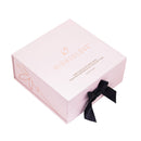 HighOnLove Dark Chocolate Body Paint elegant packaging with a black ribbon, designed for sensory intimate experiences.