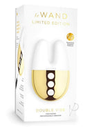 Le Wand Double Vibe Silicone Vibrator White Gold packaging with gold and white design, twin motors for dual stimulation.