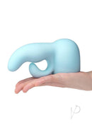 Le Wand Dual Weighted Silicone Attachment Blue in hand showcasing its unique design for dual stimulation.