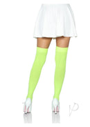 Leg Avenue Nylon Over The Knee Stockings Neon Green worn with a white skirt and high heels, showcasing vibrant style.