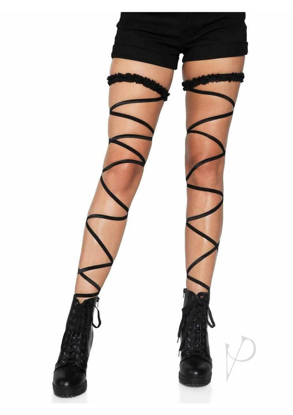 Leg Avenue Garter Leg Wrap Set OS Black featuring crisscross straps on legs, styled with black shorts and lace-up boots.