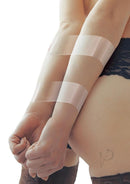 Whipsmart 100 Foot Bondage Tape Clear wrapped around wrists for restraints.